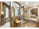 Spacious bathroom with a large walk-in shower, glass block, and slate tile at 123 Cherry St, Roswell, GA 30075