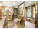 Spa-like bathroom featuring a walk-in shower with glass block accents and slate tile at 123 Cherry St, Roswell, GA 30075