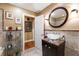 Modern bathroom with a glass vessel sink and marble countertops at 123 Cherry St, Roswell, GA 30075