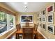 Bright dining room with hardwood floors and large windows at 123 Cherry St, Roswell, GA 30075