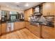 Modern kitchen with stainless steel appliances and granite countertops at 123 Cherry St, Roswell, GA 30075