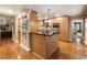 Modern kitchen with granite countertops and stainless steel appliances at 123 Cherry St, Roswell, GA 30075