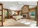 Spacious main bedroom with a fireplace and hardwood floors at 123 Cherry St, Roswell, GA 30075