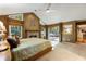 Primary bedroom with fireplace, large windows and access to private patio at 123 Cherry St, Roswell, GA 30075