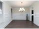 Formal dining room with hardwood floors, wainscoting, and chandelier at 3394 Bryerstone Se Cir, Smyrna, GA 30080