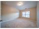 Spacious bedroom with carpet and a window at 4280 Hunters Walk Way, Cumming, GA 30028