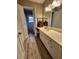 Updated bathroom with double vanity and modern fixtures at 2479 Landeau Cir, Tucker, GA 30084