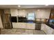 Spacious kitchen features stainless steel appliances and granite countertops at 2479 Landeau Cir, Tucker, GA 30084
