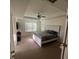 Large bedroom with carpeted floors and a ceiling fan at 602 Lofty Sw Ln, Atlanta, GA 30331