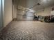Attached garage with epoxy coated flooring at 602 Lofty Sw Ln, Atlanta, GA 30331