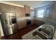 Modern kitchen featuring stainless steel appliances and granite countertops at 602 Lofty Sw Ln, Atlanta, GA 30331