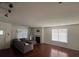 Spacious living room with hardwood floors and a fireplace at 602 Lofty Sw Ln, Atlanta, GA 30331