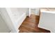 Bathroom with tub and shower, wood-look flooring at 7512 Rutgers Cir, Fairburn, GA 30213