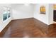 Spacious living room with hardwood floors and a neutral color palette at 7512 Rutgers Cir, Fairburn, GA 30213
