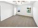 Bright and spacious main bedroom with neutral carpeting and ample natural light at 7512 Rutgers Cir, Fairburn, GA 30213