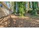 House with a spacious backyard and wooded area at 2196 Swallow Se Cir, Atlanta, GA 30315
