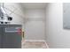 Laundry area with shelving and water heater at 2196 Swallow Se Cir, Atlanta, GA 30315