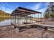 Covered boat dock on a lakefront property at 923 Pine Cir, Woodstock, GA 30189