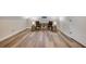 Large bonus room with wood-look flooring and two chairs at 923 Pine Cir, Woodstock, GA 30189