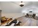 Bonus room with a cowhide rug and ceiling fan at 923 Pine Cir, Woodstock, GA 30189