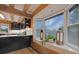 Modern kitchen with black cabinets and a window seat at 923 Pine Cir, Woodstock, GA 30189
