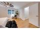 Main bedroom with hardwood floors and walk-in closet at 923 Pine Cir, Woodstock, GA 30189