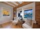 Charming sitting area with hardwood floors and windows offering a view of nature at 923 Pine Cir, Woodstock, GA 30189