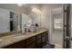 Bathroom with double sinks and granite countertop at 5269 Heron Bay Blvd, Locust Grove, GA 30248