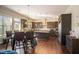 Modern kitchen with dark cabinetry and granite countertops at 5269 Heron Bay Blvd, Locust Grove, GA 30248