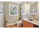 Modern powder room with floating sink and unique vessel sink at 446 Cumberland Ave, Dallas, GA 30157