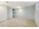 Finished basement room featuring vinyl flooring and neutral walls at 2080 Singer Way, Lithonia, GA 30058