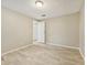 Spacious bedroom with light wood-look flooring and neutral walls at 2080 Singer Way, Lithonia, GA 30058