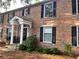 Brick building with black shutters and a classic design at 6700 Roswell Rd # 13B, Atlanta, GA 30328