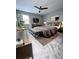 Spacious Primary bedroom with plush bedding and a large TV at 6700 Roswell Rd # 13B, Atlanta, GA 30328