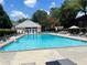 Inviting community pool with plenty of lounge chairs at 6700 Roswell Rd # 13B, Atlanta, GA 30328