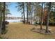 Large backyard with lake views and mature trees at 2440 Emerald Dr, Jonesboro, GA 30236