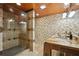 Basement bathroom with double sinks and a walk-in shower at 2440 Emerald Dr, Jonesboro, GA 30236