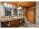 Double vanity bathroom with stone countertops at 2440 Emerald Dr, Jonesboro, GA 30236