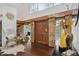 Bright entryway with hardwood floors, stone accents, and a comfortable seating area at 2440 Emerald Dr, Jonesboro, GA 30236