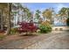 Home with circular driveway and landscaping at 2440 Emerald Dr, Jonesboro, GA 30236