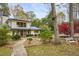 Home with stone walkway and lush landscaping at 2440 Emerald Dr, Jonesboro, GA 30236