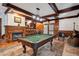Game room with a pool table, fireplace, and a wet bar at 2440 Emerald Dr, Jonesboro, GA 30236