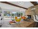 Gathering room with stunning pool and lake views, featuring comfortable seating at 2440 Emerald Dr, Jonesboro, GA 30236