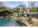 Luxury home showcasing a resort-style pool and patio area at 2440 Emerald Dr, Jonesboro, GA 30236