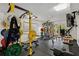 Home gym with weight rack, bench, and TV at 2440 Emerald Dr, Jonesboro, GA 30236