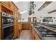 Modern kitchen with stainless steel appliances and custom wood cabinetry at 2440 Emerald Dr, Jonesboro, GA 30236