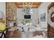 Spacious living area with stone fireplace and piano at 2440 Emerald Dr, Jonesboro, GA 30236