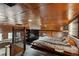 Main bedroom with platform bed and a view of the kitchen at 2440 Emerald Dr, Jonesboro, GA 30236
