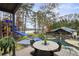 Patio overlooking pool and lake with seating and lake views at 2440 Emerald Dr, Jonesboro, GA 30236