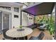 Modern patio with pergola, seating, and dining area at 2440 Emerald Dr, Jonesboro, GA 30236